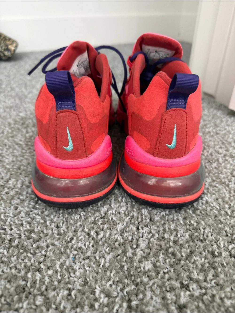 Bright Pink Nike Athletic Sneakers with Navy Laces